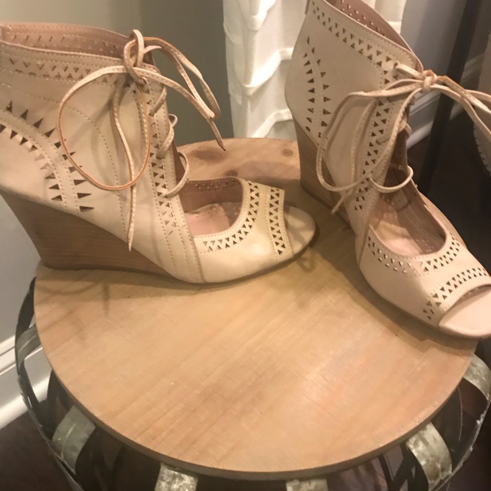 Restricted neutral wood heel open toe bootie